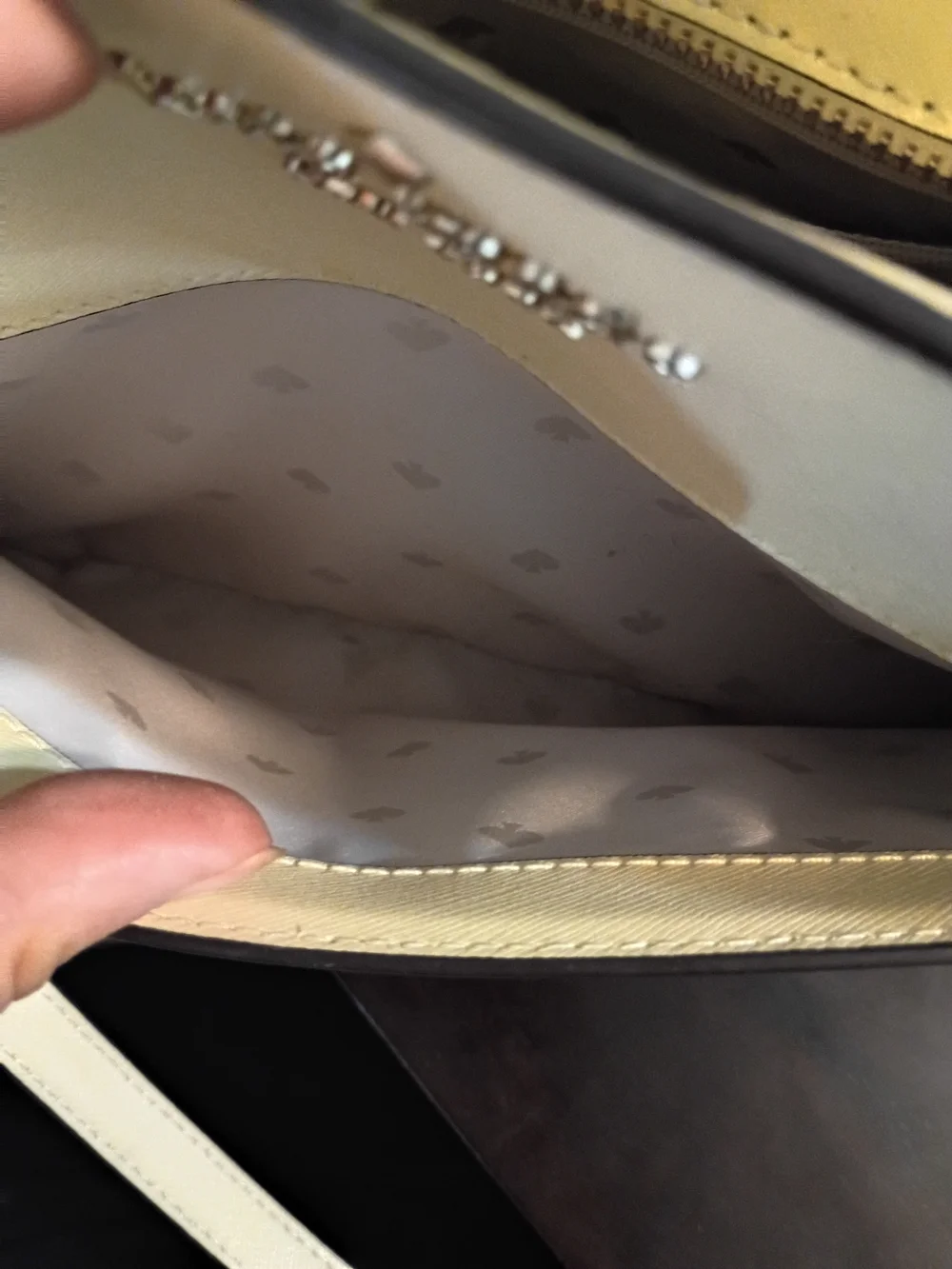 Kate Spade Staci Medium Satchel in a light yellow colorway.